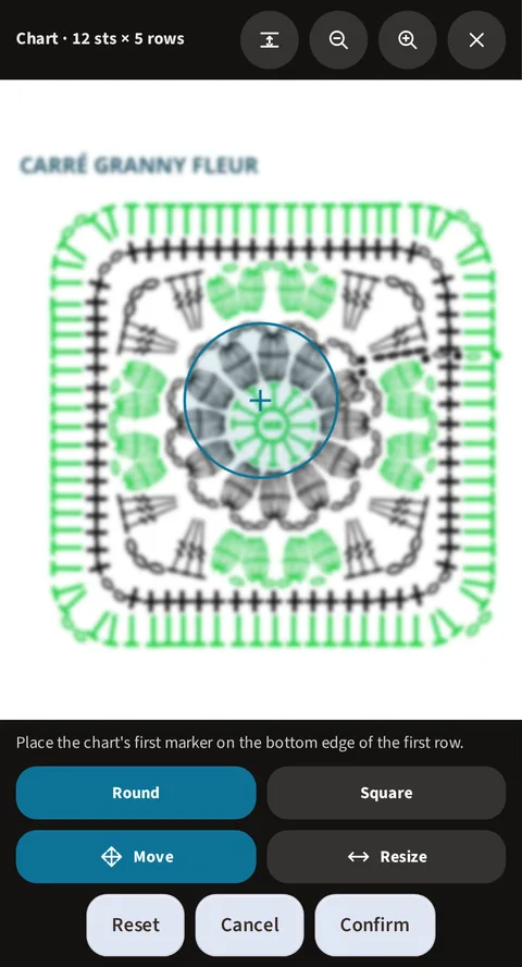 The same granny alignment assistant, the boundary declared round this time: the round loupe, marked with the same cross, circling the same central flower of the blurred-stitch square, the Round and Square buttons (Round active), then Move, active as well, Resize, and at the bottom Reset, Cancel and Confirm