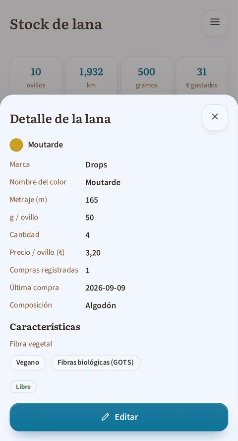 La ficha se abre sobre el stock y sus totales 10 ovillos, 1,932 km, 500 gramos y 31 € gastados: punto amarillo Moutarde, marca Drops, 165 m, 50 g por ovillo, cantidad 4 a 3,20 €, última compra 2026-08-12